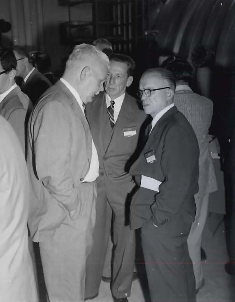 Two men talking.