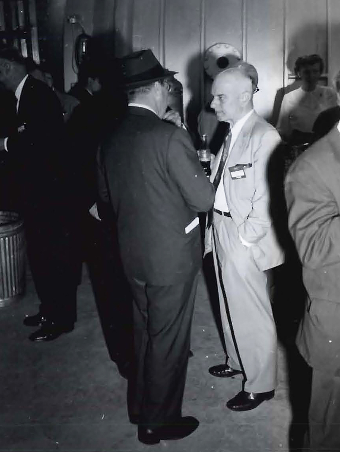 Two men talking.