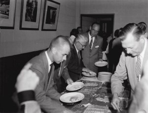 People at buffet table.