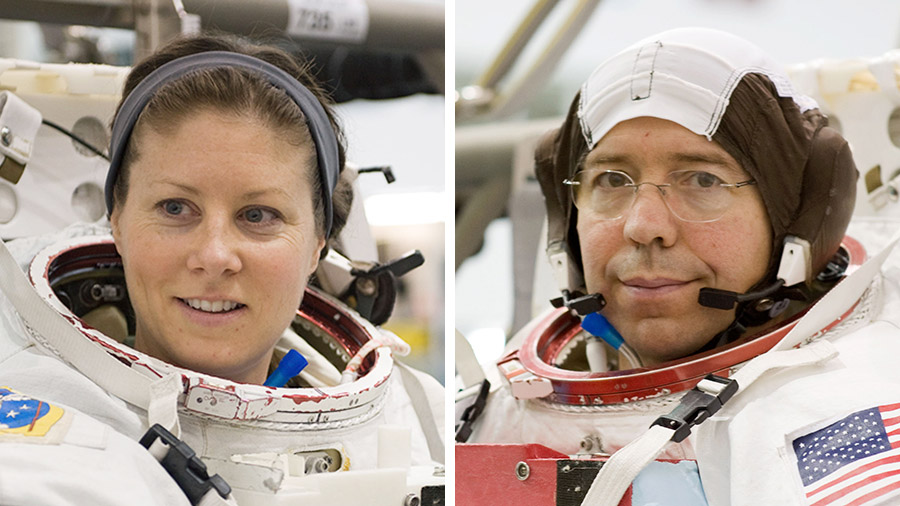 NASA astronauts Tracy C. Dyson and Mike Barratt are pictured training for spacewalks at the Johnson Space Center's Neutral Bouyancy Laboratory in Houston, Texas.