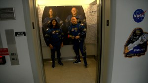 After suit-up and final fit checks, NASA’s Boeing Crew Flight Test astronauts Suni Williams and Butch Wilmore enter the elevator in the Astronaut Crew Quarters on Saturday, June 1, 2024, inside Kennedy Space Center’s Neil A. Armstrong Operations and Checkout Building in Florida.