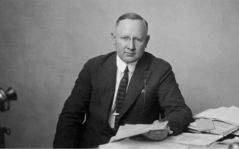 Man sitting at desk.