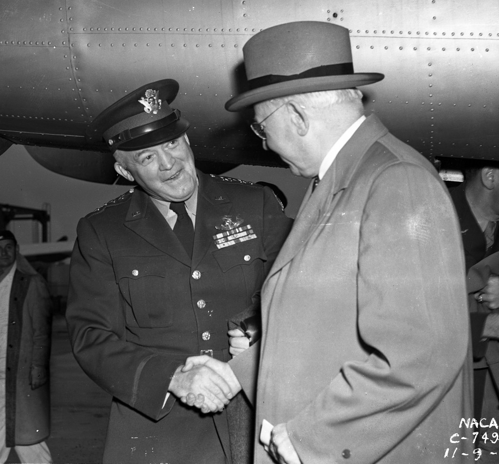 Two men shaking hands.