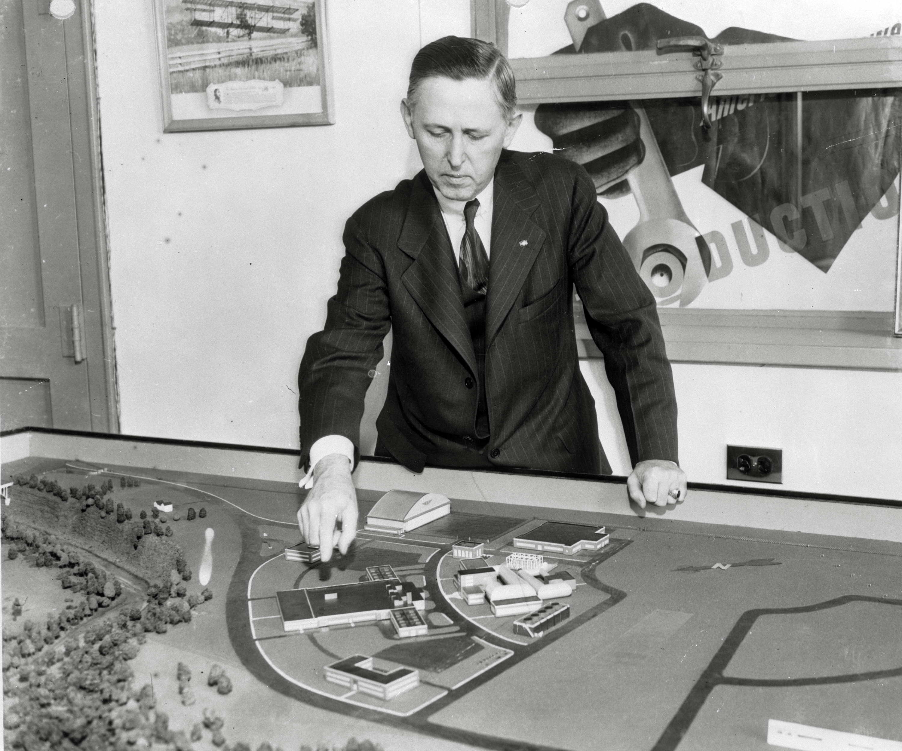 Man viewing model of NACA campus.