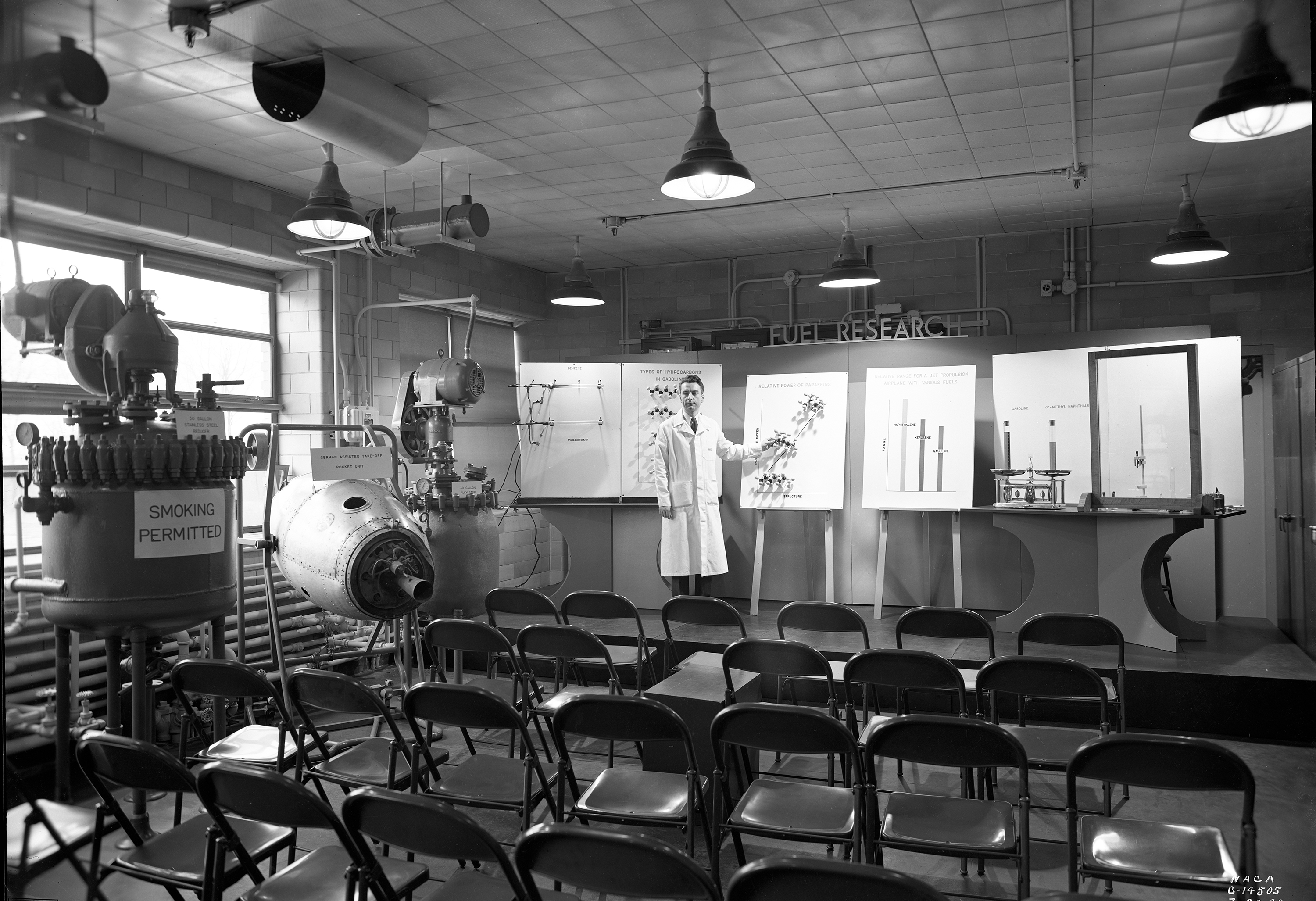 Man standing in front of exhibit.