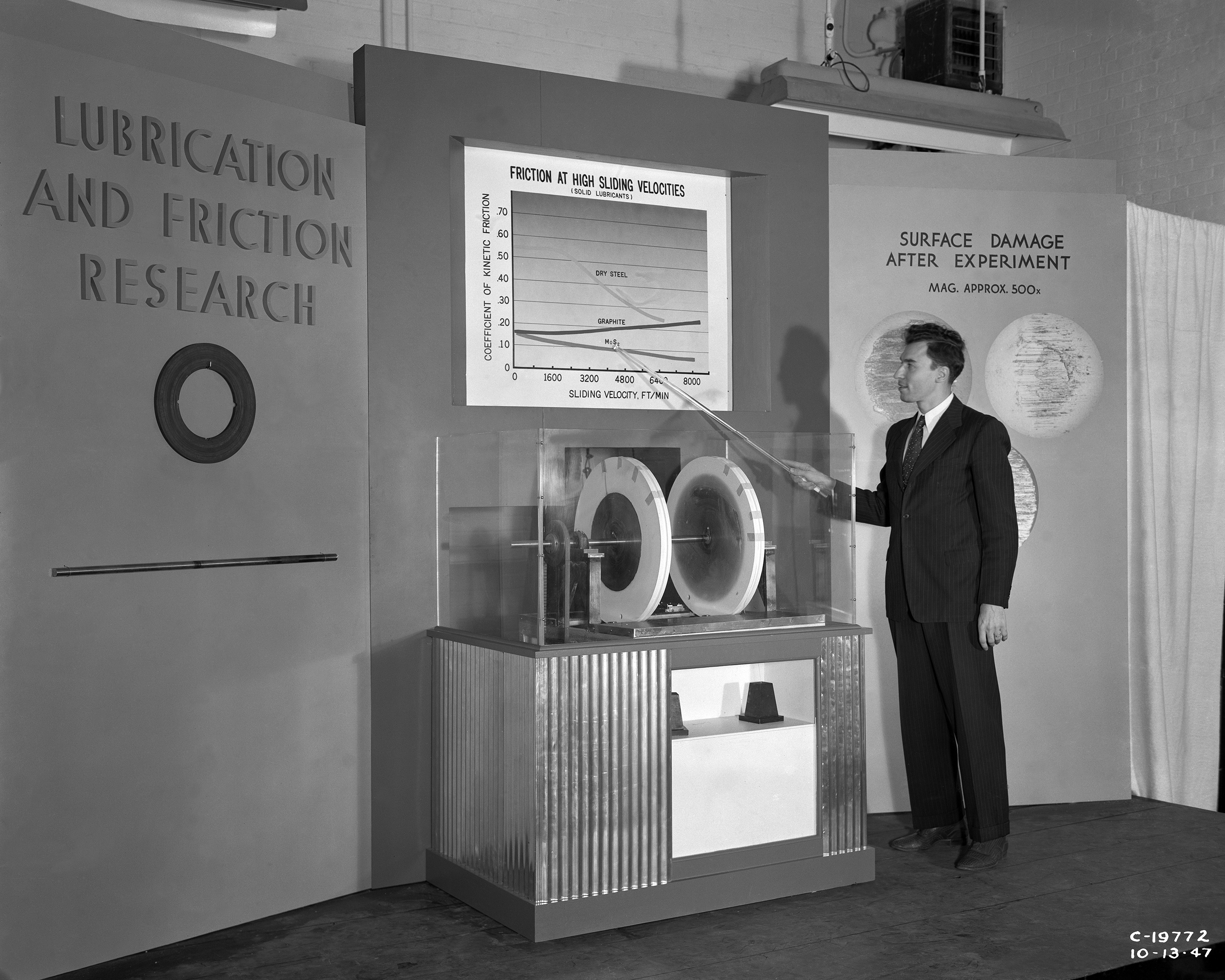 Man pointing to display.