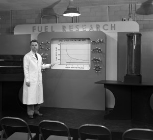 Man pointing to display.