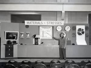 Man pointing to exhibit.