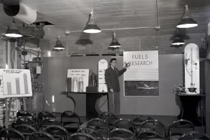 Man pointing to exhibit.