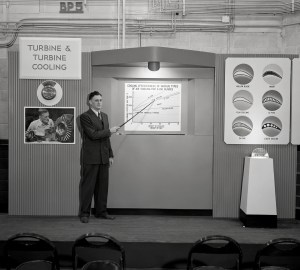 Man pointing to exhibit.