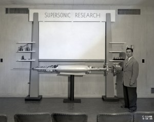 Man pointing to exhibit.