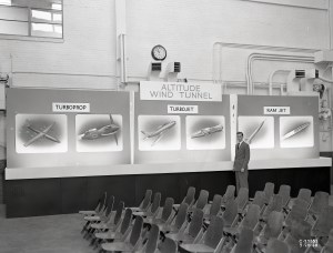 Man pointing to exhibit.