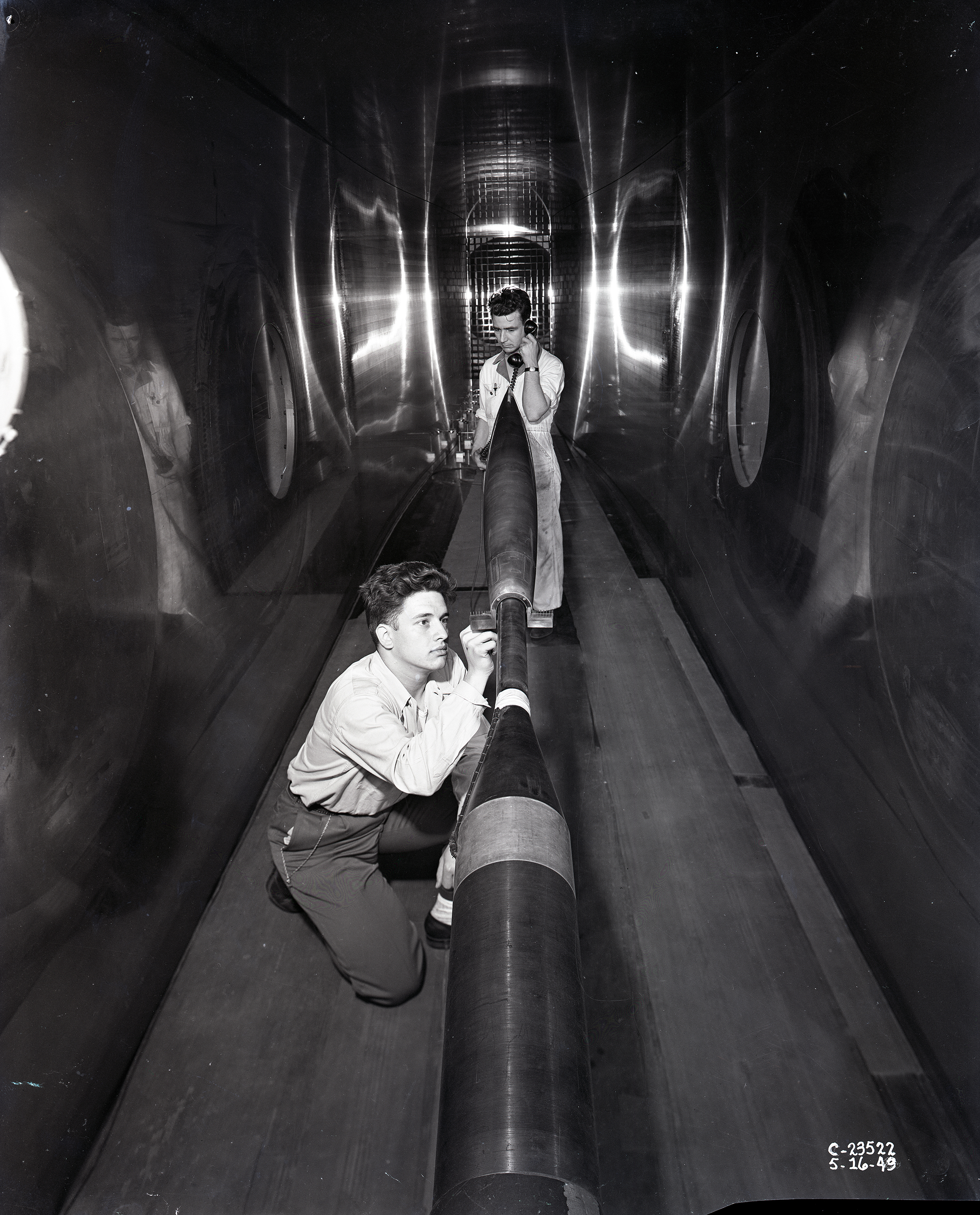 Two men in test section.