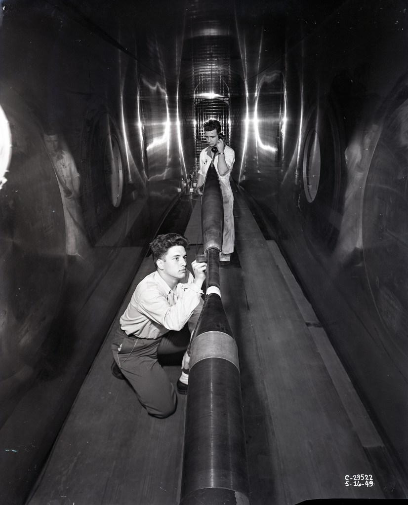 Two men in test section.