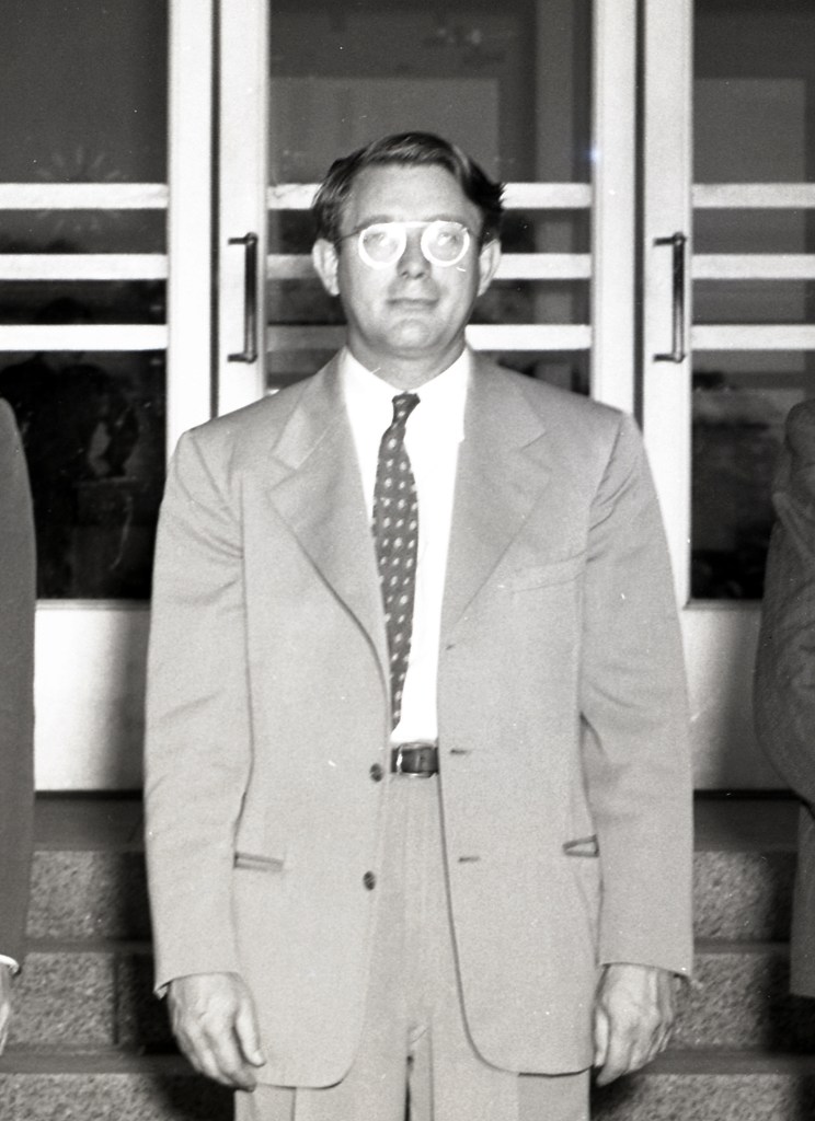 Man standing.