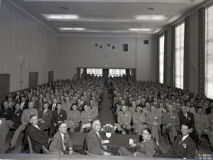 Group seated in auditorium.