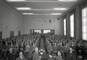Group seated in auditorium.