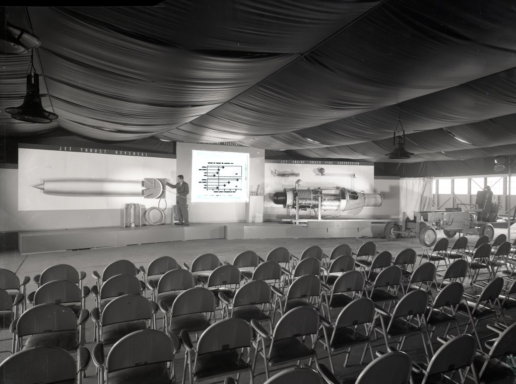 Chairs set up in front of display.