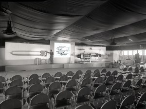 Chairs set up in front of display.