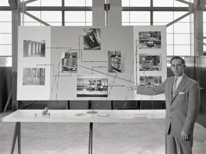 Man pointing to display.