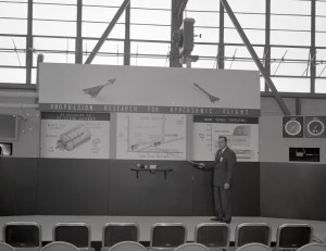 Man with exhibit.