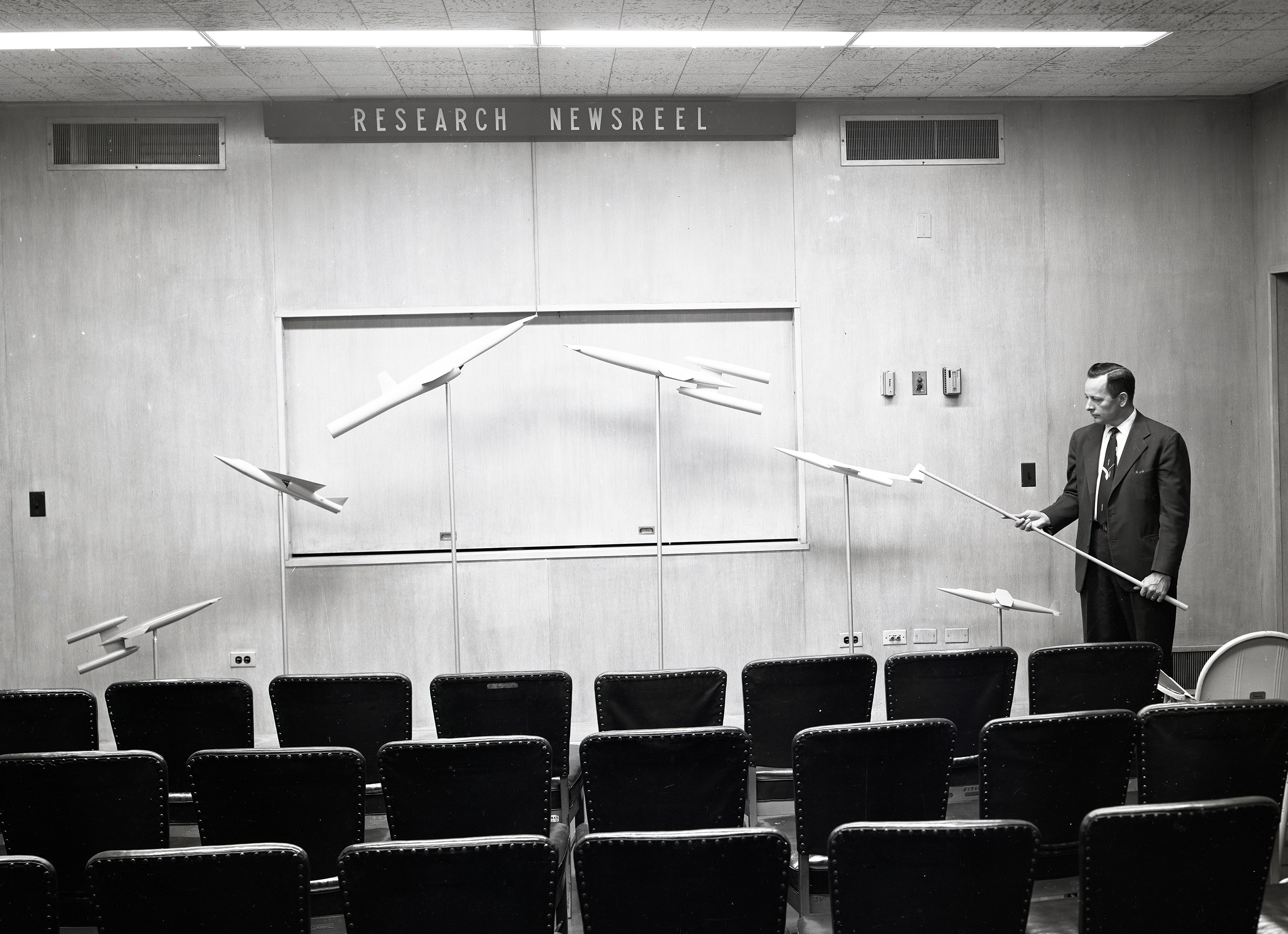 Man with exhibit.