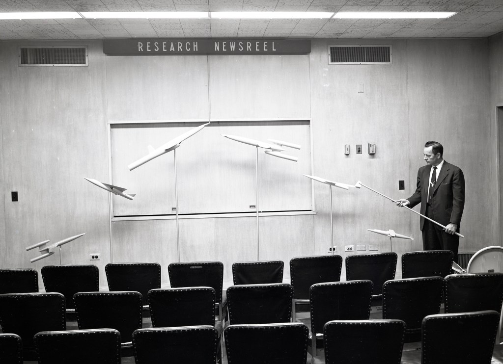Man with exhibit.
