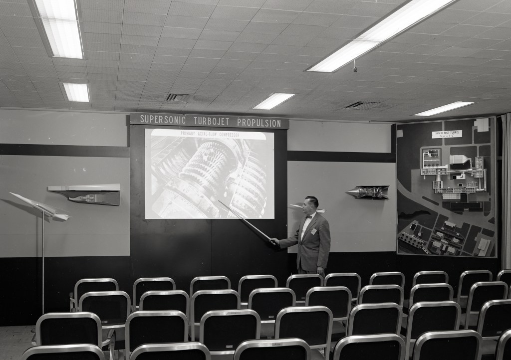 Man with exhibit.