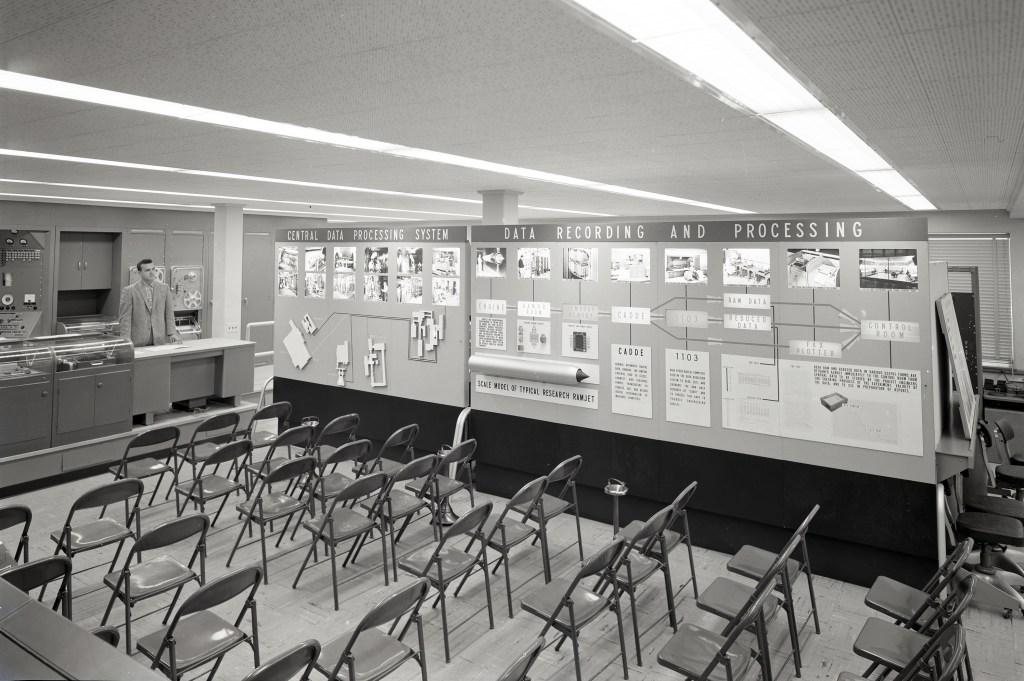 Empty chairs by exhibit.