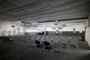 Empty chairs by exhibit.