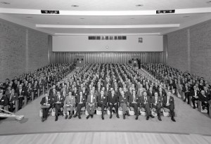 Group seated in auditorium.