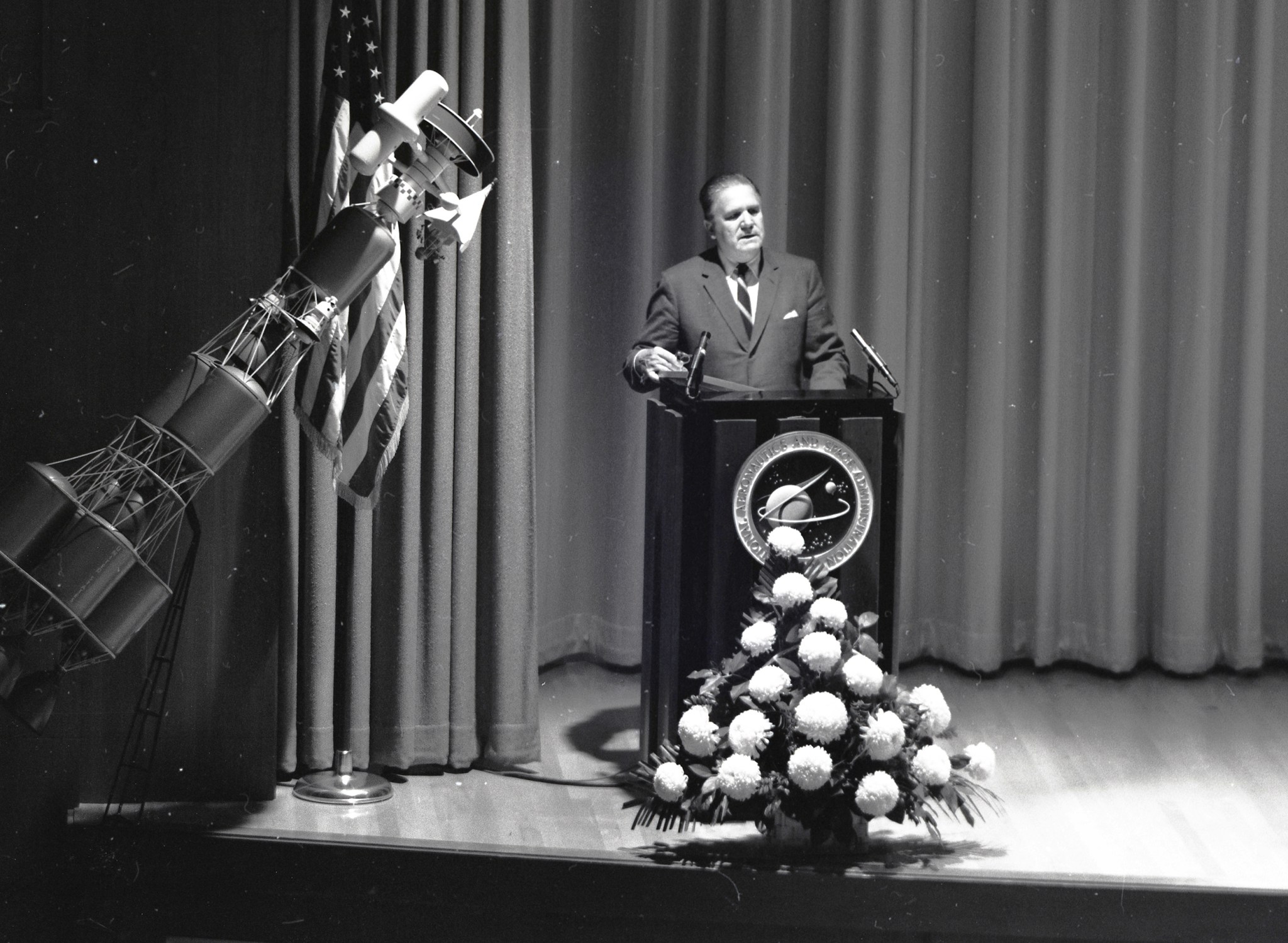 Man at podium.