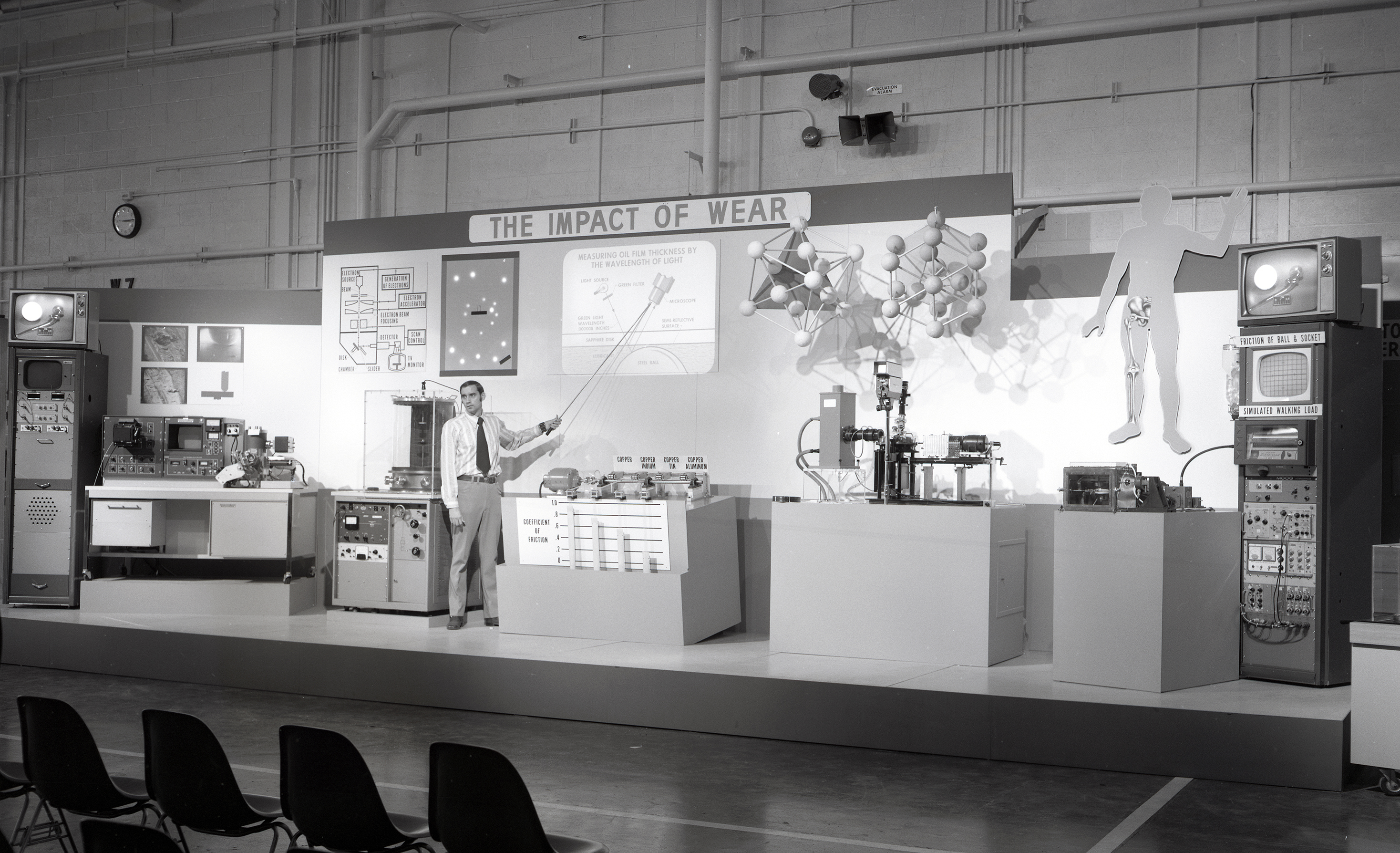 Man with exhibit.