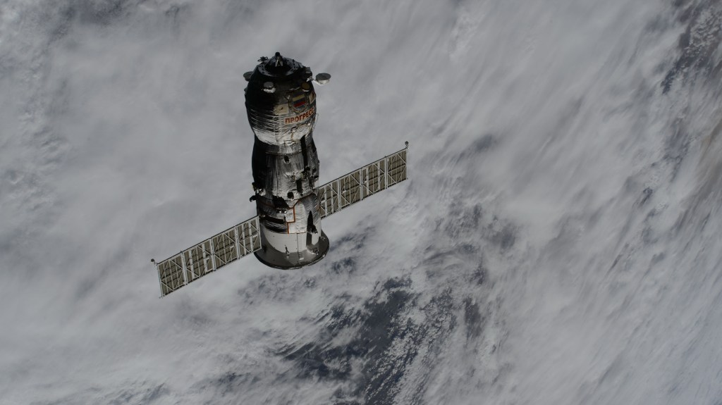 The uncrewed Roscosmos Progress 86 cargo craft, packed with trash and obsolete gear, departs the vicinity of the International Space Station after undocking from the Poisk module ending a six-month cargo mission.