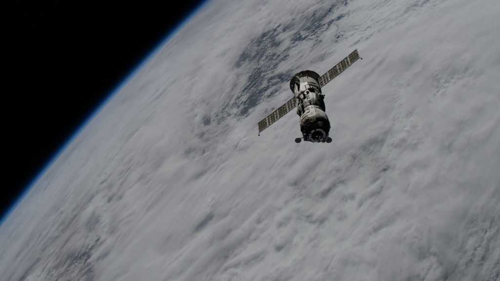 The uncrewed Roscosmos Progress 86 cargo craft, packed with trash and obsolete gear, departs the vicinity of the International Space Station after undocking from the Poisk module ending a six-month cargo mission.