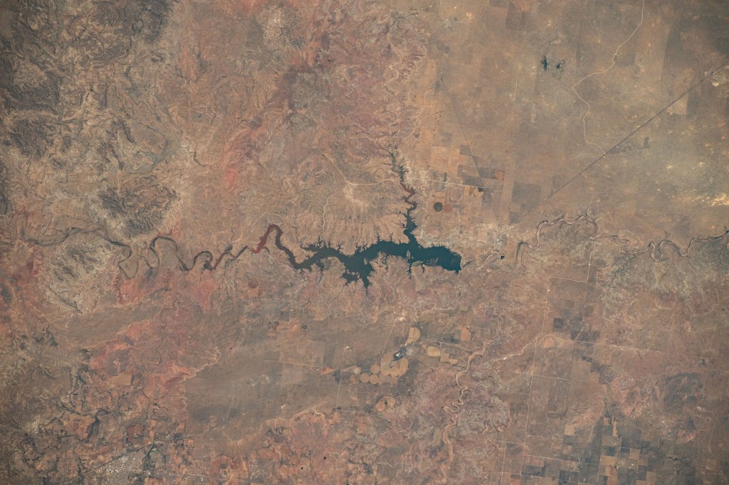 Ute Reservoir in Utah, created by Ute Dam in New Mexico and filled by the Canadian River, is pictured frm the International Space Station as it orbited 262 miles above the southwestern United States.