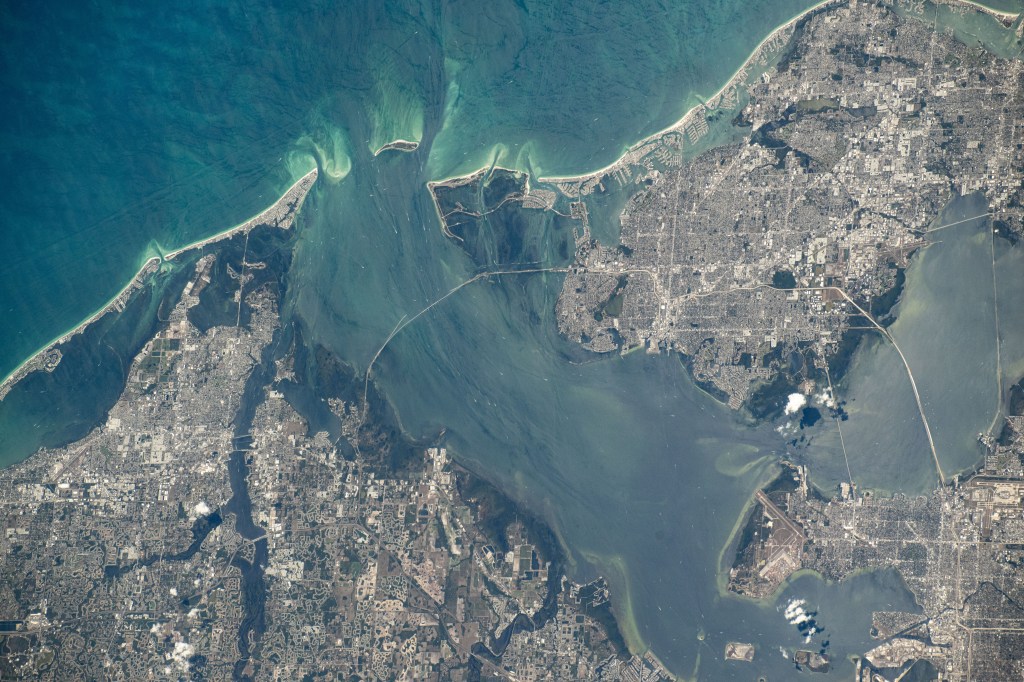 Tampa, Florida, and its surrounding suburbs on Tampa Bay and the Gulf of Mexico are pictured from the International Space Station as it orbited 261 miles above the Sunshine State.