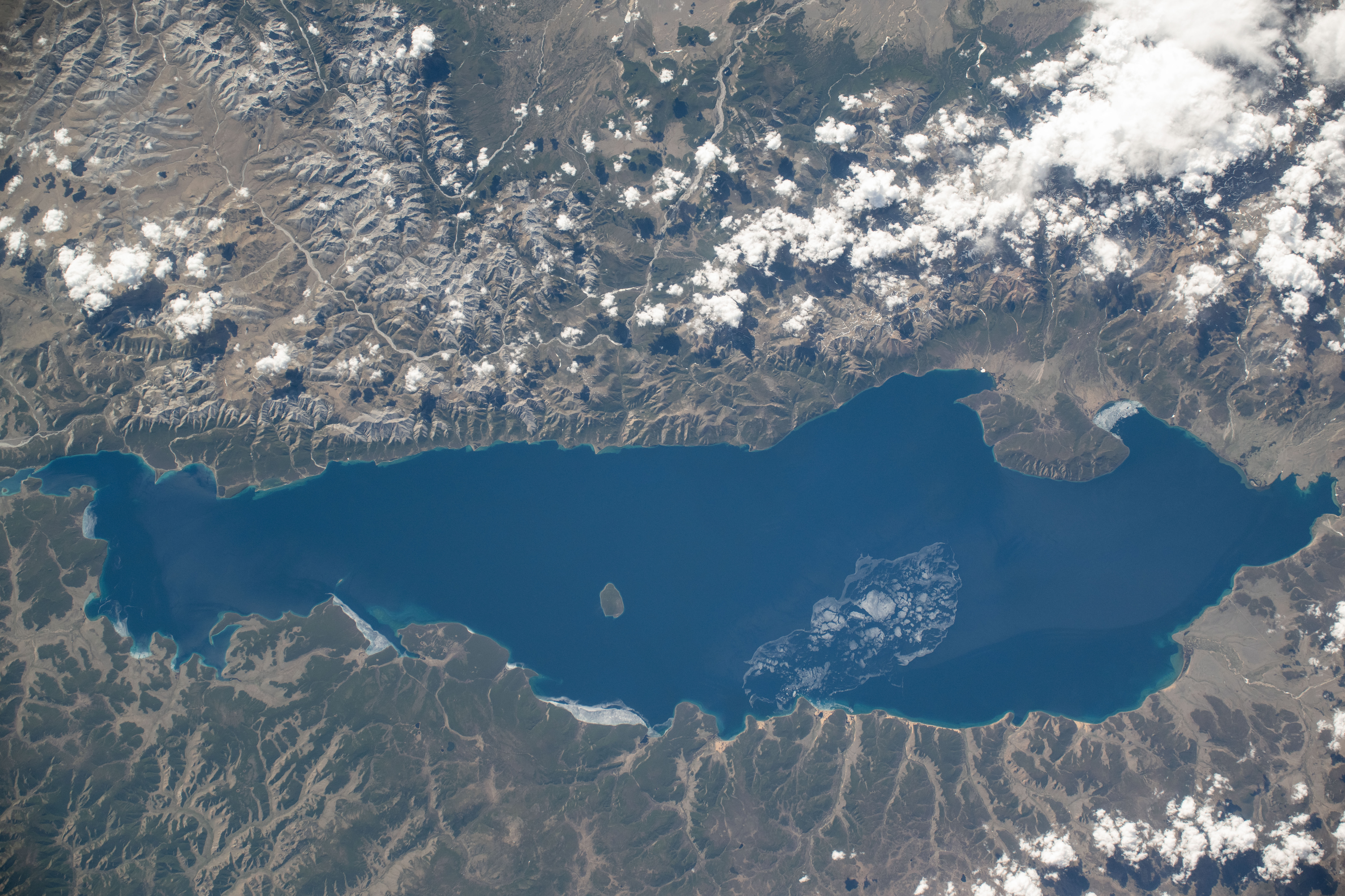 Lake Khövsgöl, Mongolia's largest freshwater lake, is about 5,400 feet (1,650 meters) above sea level and over 2 million years old in this photograph from the International Space Station as it orbited 264 miles above.
