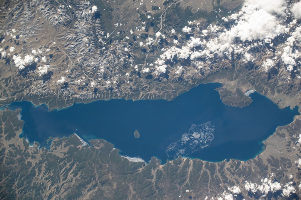 Lake Khövsgöl, Mongolia's largest freshwater lake, is about 5,400 feet (1,650 meters) above sea level and over 2 million years old in this photograph from the International Space Station as it orbited 264 miles above.