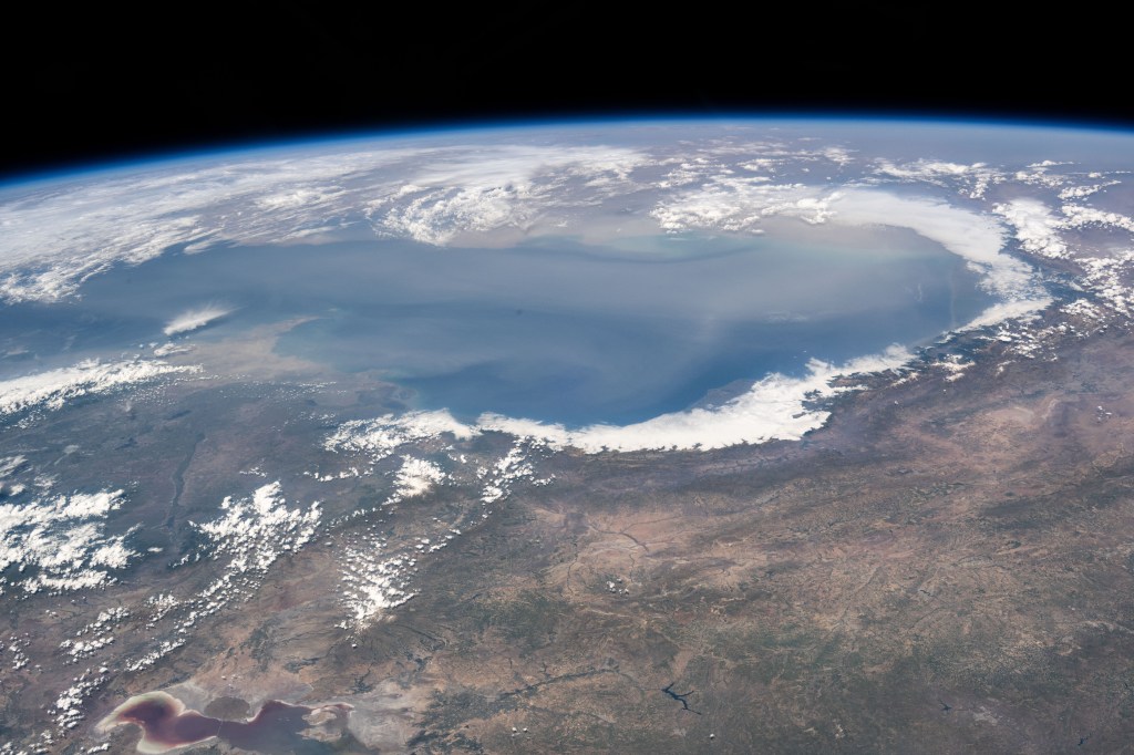 The world's largest inland body of water, the Caspian Sea rests in between Europe and Asia and is bordered by the nations of Russia, Kazakhstan, Turkmenistan, Iran, and Azerbaijan. The International Space Station was orbiting 262 miles above Erbil, Iraq, at the time of this photograph.