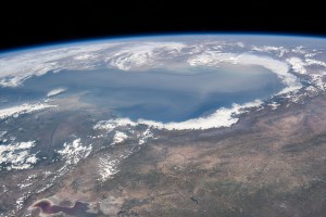 The world's largest inland body of water, the Caspian Sea rests in between Europe and Asia and is bordered by the nations of Russia, Kazakhstan, Turkmenistan, Iran, and Azerbaijan. The International Space Station was orbiting 262 miles above Erbil, Iraq, at the time of this photograph.