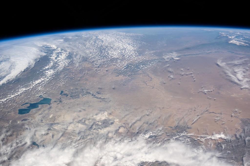 The North Aral Sea (at left) is seemingly dwarfed by the vast landscape of Kazakhstan in this photograph from the International Space Station as it was orbiting 262 miles above.