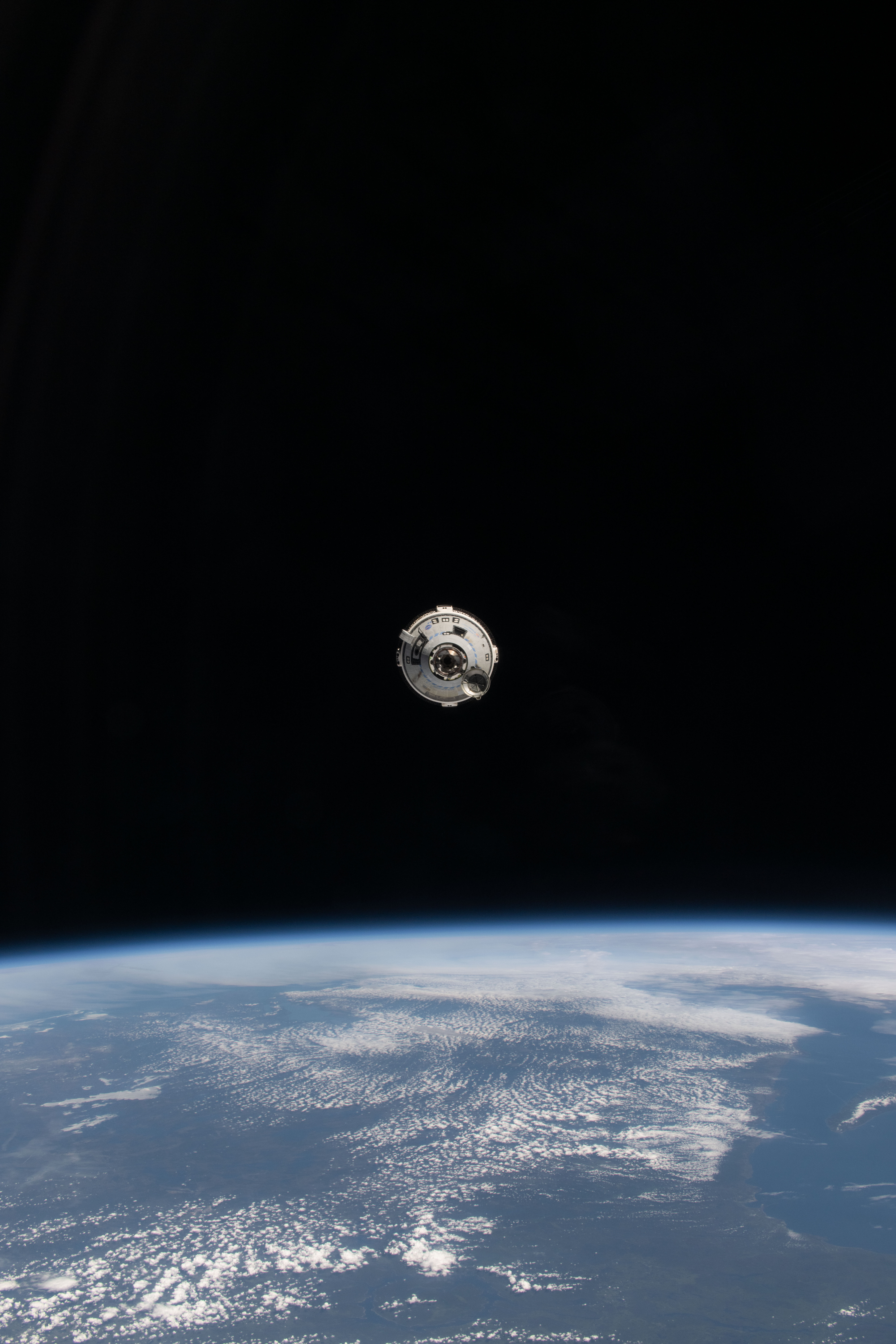 The Starliner spacecraft on NASA's Boeing Crew Flight Test approaches the International Space Station while orbiting 263 miles above Quebec, Canada. NASA astronauts Butch Wilmore and Suni Williams aboard Starliner would dock to the orbital outpost's forward port on the Harmony module at 1:34 p.m. EDT on Thursday, June 6.