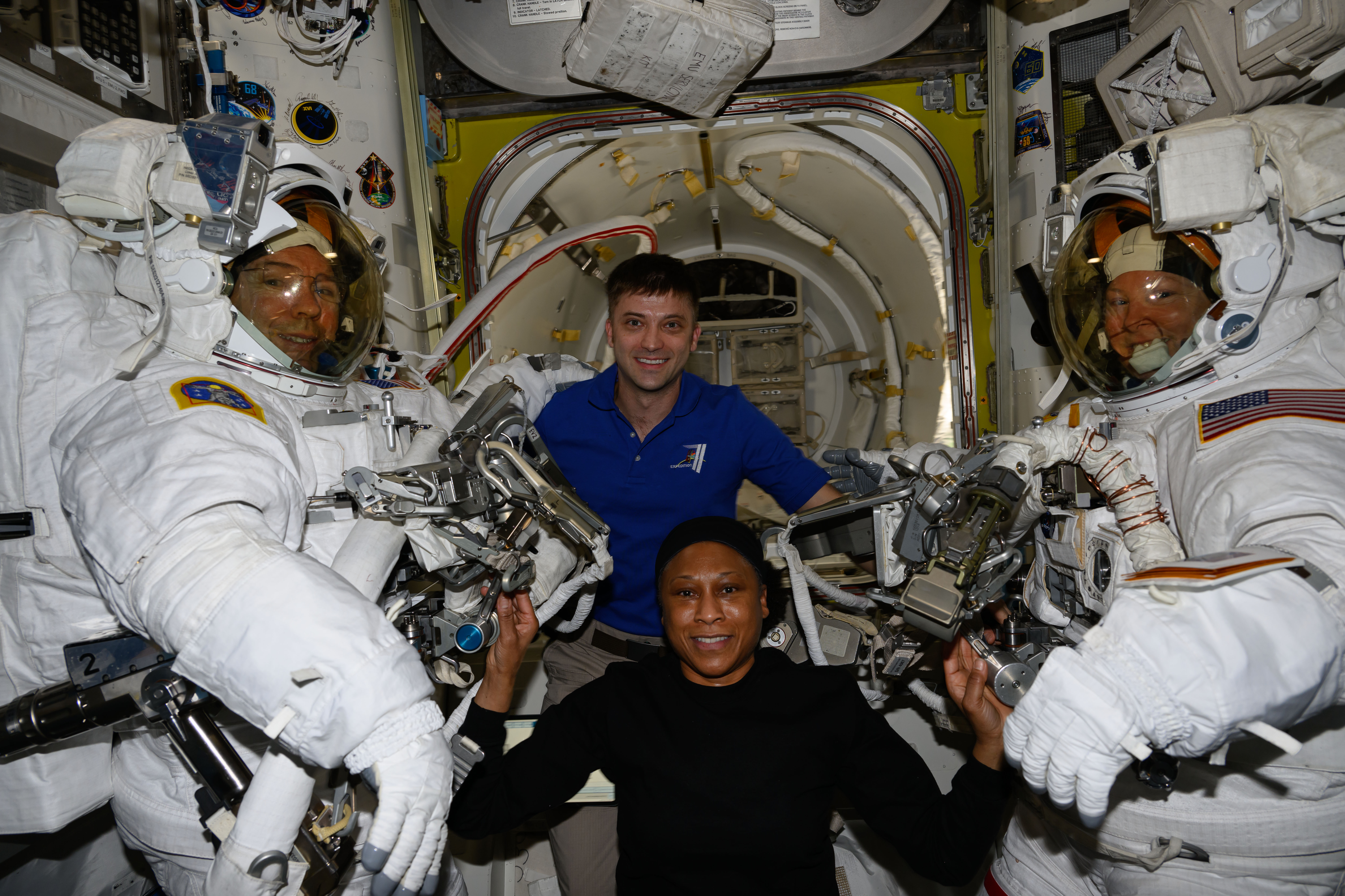 At center, Expedition 71 Flight Engineers Matthew Dominick and Jeanette Epps pose with Expedition 71 Flight Engineers (from left) Mike Barratt and ...