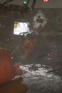 During water survival training at the NBL, teams will simulate rain conditions, seen here, to train crews for various conditions upon landing. Credit: NASA/David DeHoyos