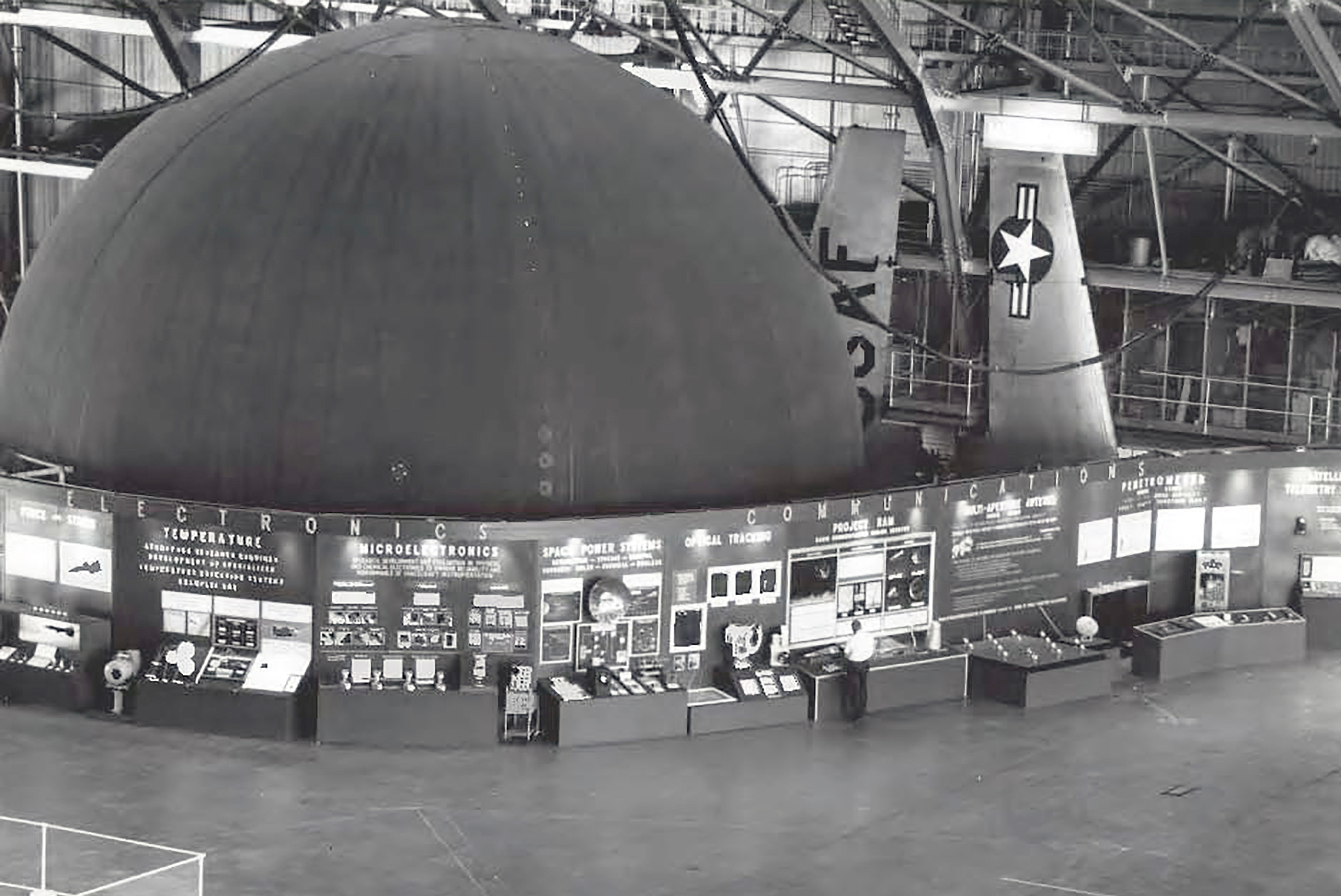 Exhibits inside hangar.