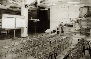 Empty chairs by exhibit.