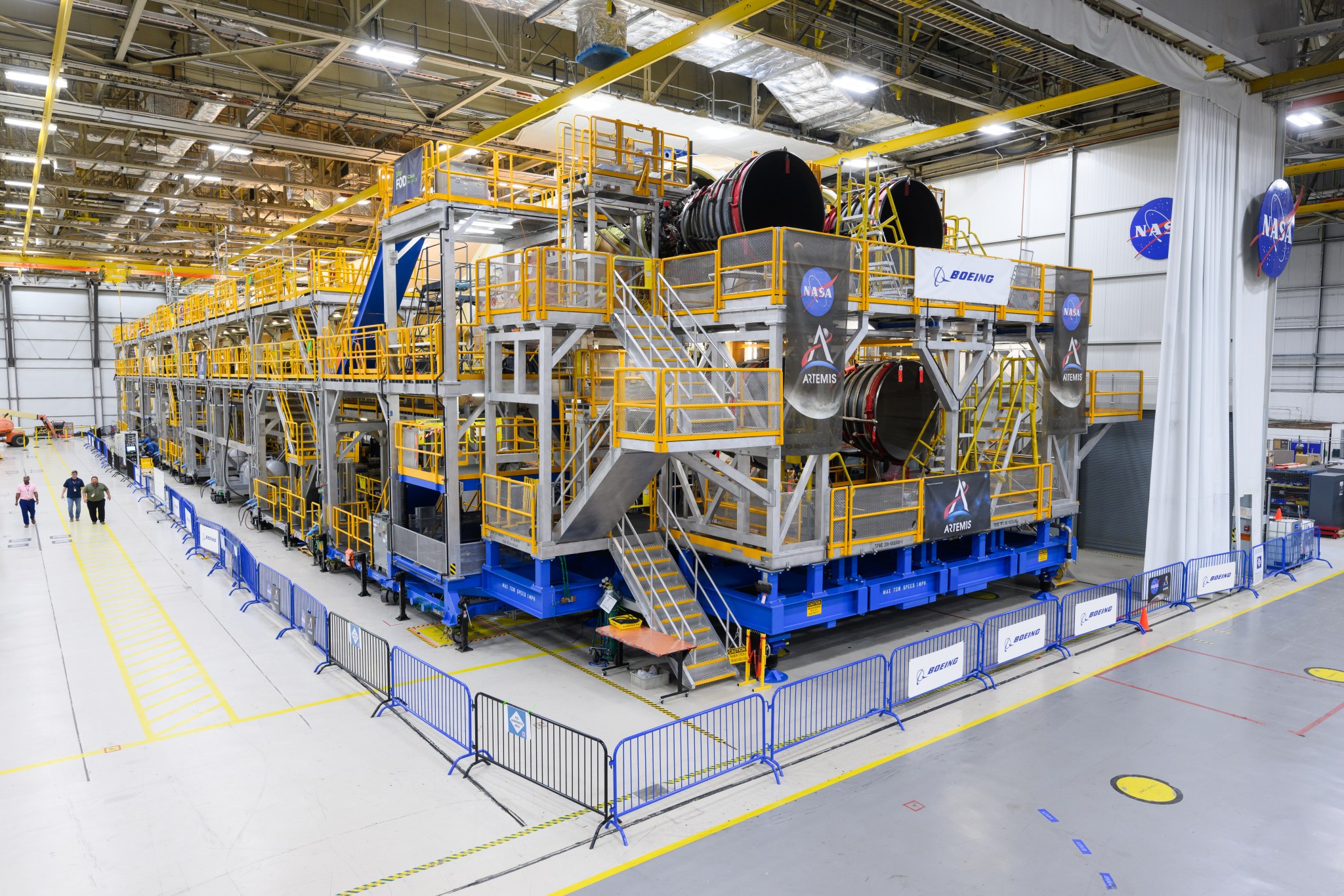 The core stage is the backbone of the SLS (Space Launch System) rocket that will help power NASA’s Artemis II mission to send a crew of four astronauts around the Moon in 2025. Here, the core stage is currently behind scaffolding to allow work to continue at NASA’s Michoud Assembly Facility in New Orleans. The stage’s two massive propellant tanks hold a collective 733,000 gallons of liquid propellant to power the four RS-25 engines at its base. Following hardware acceptance reviews and final checkouts, the stage will be readied for delivery via the agency’s Pegasus barge to NASA’s Kennedy Space Center in Florida for Artemis II launch preparations.