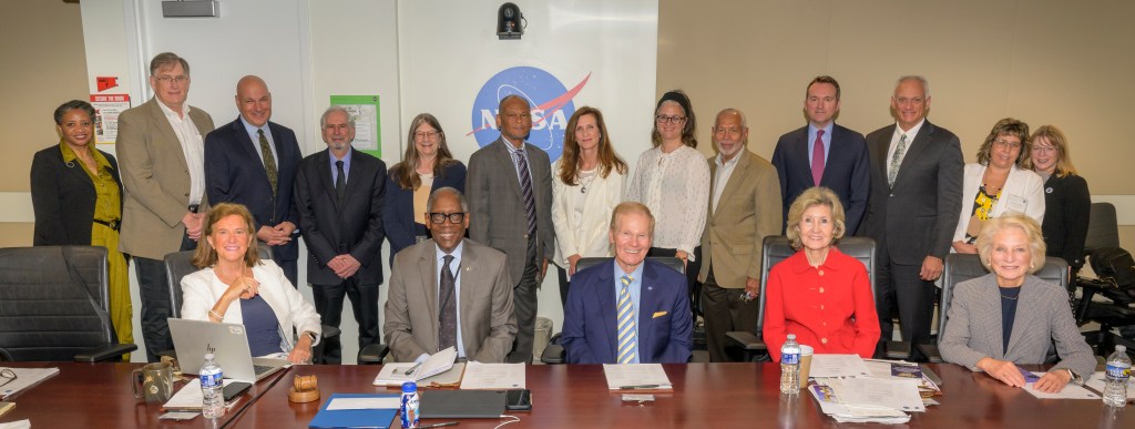 NASA Administrator Bill Nelson, seated center, poses for a group photograph with members of the NASA Advisory Council (NAC), Wednesday, May 8, 2024, at the NASA Headquarters Mary W. Jackson Building in Washington.