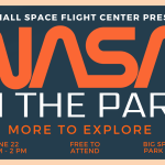 A Banner of NASA in the Park in Orange and White on a blue background with a graphic of the SLS Rocket and stars on it.